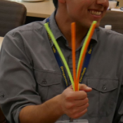 Swaying pipe cleaners with hand returning to position